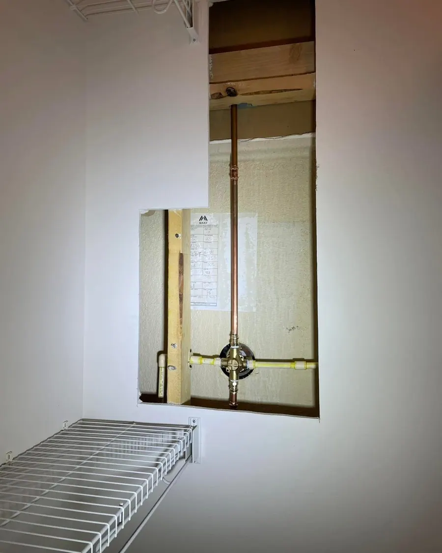 Copper riser and shut-off valve set into a finished wall cavity